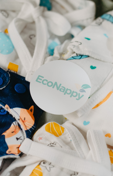 EcoNappy All-Day Essentials Pack diaper for active babies, featuring breathable muslin nappies, organic cotton cloth diaper with superior absorbency, and soft padded options for everyday use, naps, and outings. Eco-friendly, reusable, and comfortable. Diapers. Nappy, muslin clothes, briefs. 