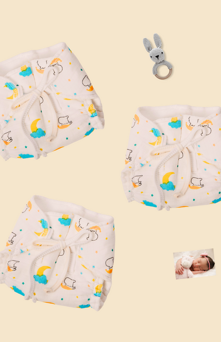 Eco-friendly airy muslin diaper for babies, a perfect gift for diaper-free time. Made with premium cotton padding to prevent diaper rash. Unique reusable design with adjustable ties and colorful prints for comfort and sustainability.