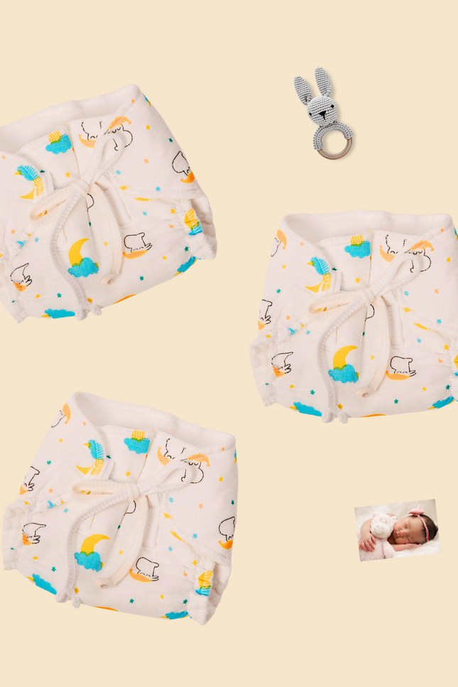 Eco-friendly airy muslin diaper for babies, a perfect gift for diaper-free time. Made with premium cotton padding to prevent diaper rash. Unique reusable design with adjustable ties and colorful prints for comfort and sustainability.