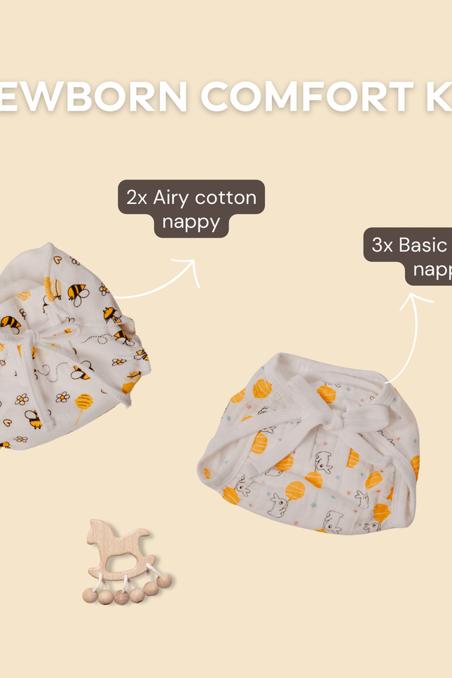 Newborn Comfort Kit with 3 muslin and 2 cotton nappies. Breathable, lightweight, and reusable, designed for rash-free comfort and diaper-free moments. Sustainable gift for baby showers or eco-conscious parents. Personalization options available.