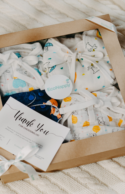 EcoNappy All-Day Essentials Pack diaper 4 active babies, featuring breathable muslin nappies, organic cotton cloth diaper with superior absorbency, and soft padded options for everyday use, naps, and outings. Eco-friendly, reusable, and comfortable.