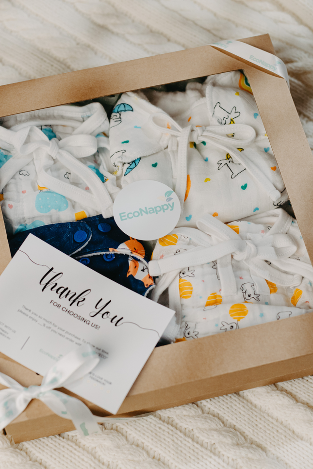 EcoNappy All-Day Essentials Pack diaper 4 active babies, featuring breathable muslin nappies, organic cotton cloth diaper with superior absorbency, and soft padded options for everyday use, naps, and outings. Eco-friendly, reusable, and comfortable.