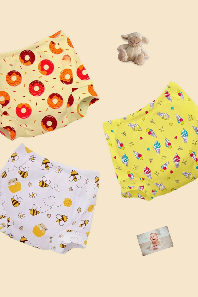 Eco-friendly potty training underwear for toddlers featuring adorable prints like donuts, bees, and ice creams. diapers, breathable, and leak-proof, perfect for hassle-free toilet training. Comfortable & ensures all-day comfort for active toddlers.