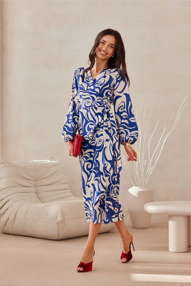 Midi dress with long sleeves. The top is wrap, and the bottom is slightly flared. It does not have a lining, with a double tie at the waist.