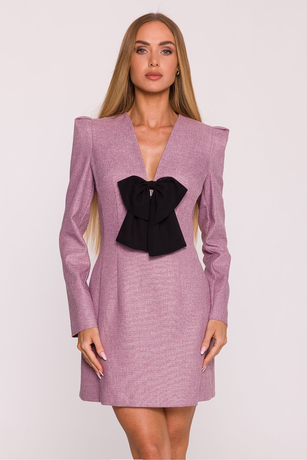 Elegant pink tweed mini dress for women with long sleeves and a black bow detail on the front. Perfect for fall or winter occasions, office wear, or evening dinners. This feminine short dress features a tailored silhouette, soft tweed texture, and refined design that flatters every body type. Ideal for women who love timeless European fashion and chic minimalist elegance.