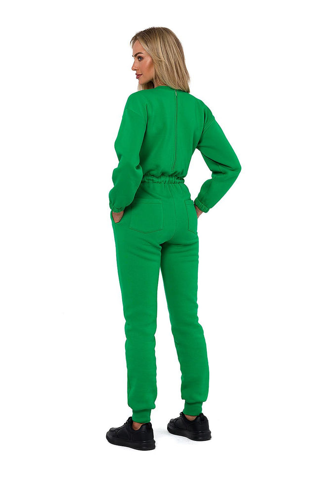 Back view of green fitted jumpsuit for women – sleek silhouette with pockets