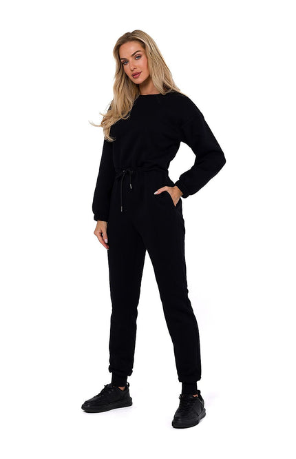 Classic black women’s jumpsuit – zip-up front, cinched waist, and side pockets